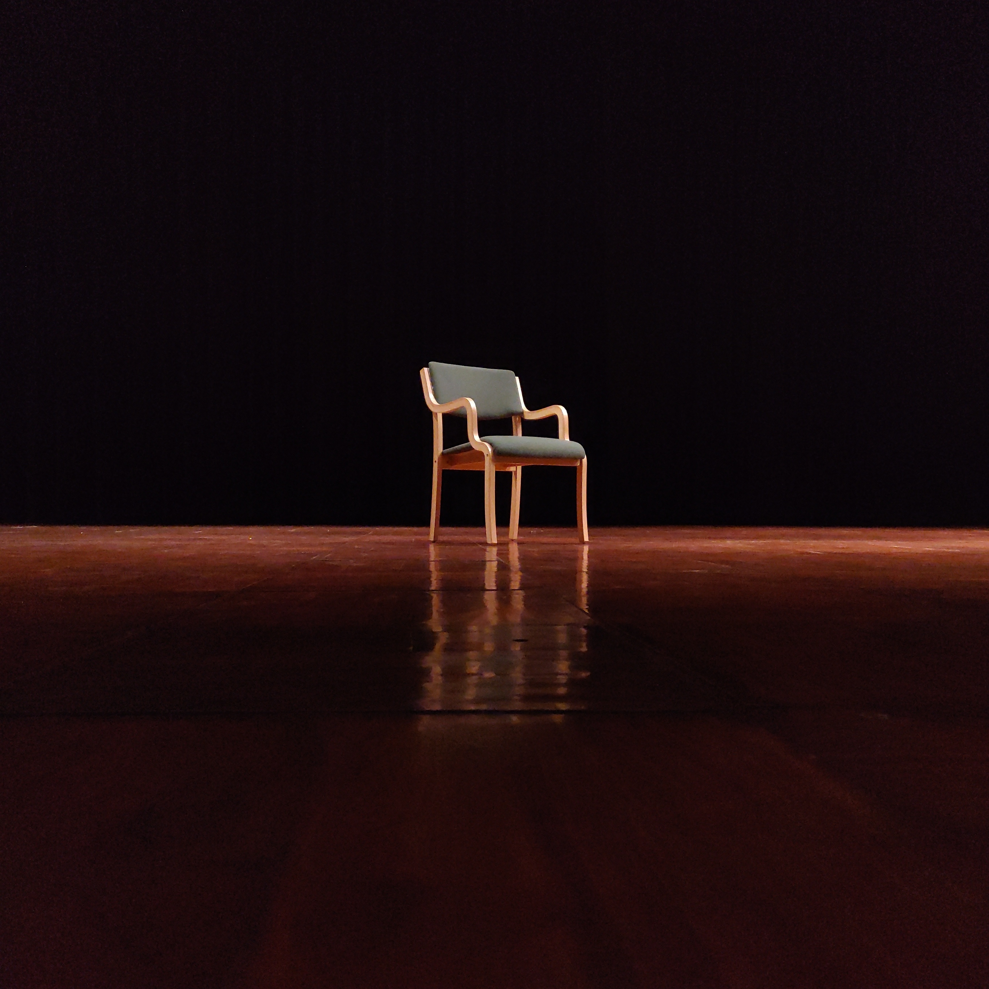Stage chair under spotlight